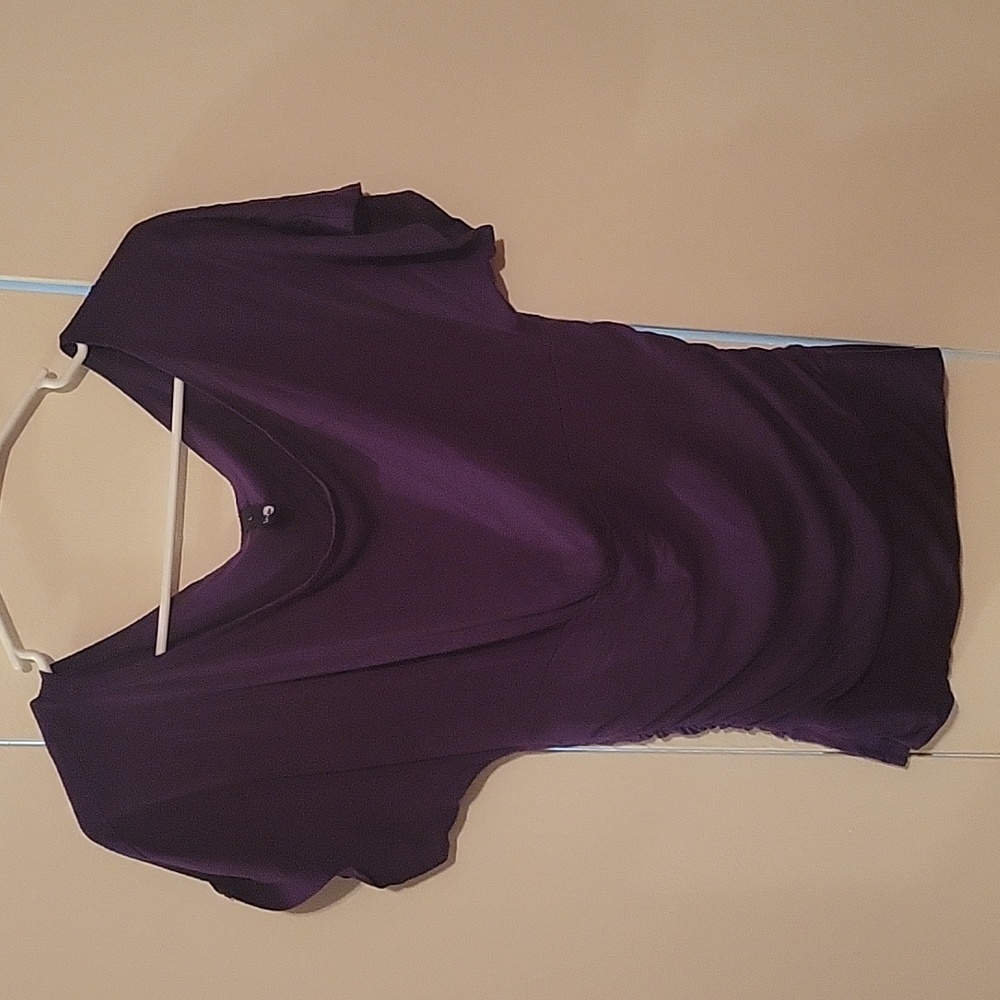 Dark purple- ing- size L- looser on top and more fitted on bottom